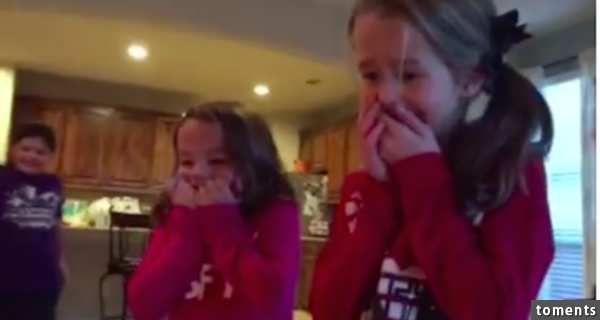 A mom and dad surprised their three daughters with the news that they had adopted a baby boy by hiding him under the Christmas tree — and the girls' reaction was completely adorable.