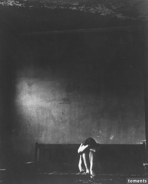 A silent, suffering inmate of an insane asylum.