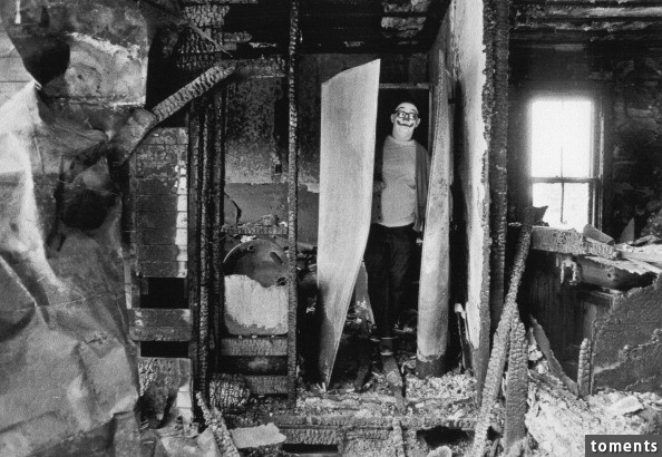 A clown in a burnt-out house, USA, 1975. Welcome to my nightmare.