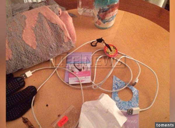 Weapon: Police have arrested the couple's son Egor on suspicion of murder. The authorities believe Ms Novikova-Sosina was attacked with a mobile phone charger cable, like the one above in the room