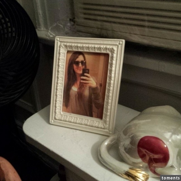 The framed selfie is truly horrifying.