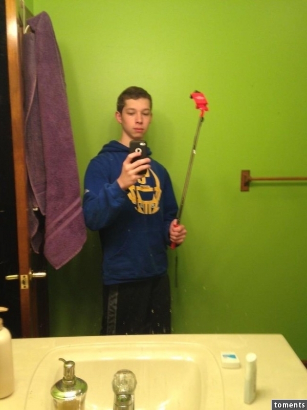 Showing off that new selfie stick...by taking a selfie with it.