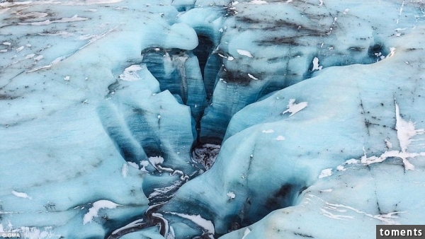 SmugMug, an online photo service, used drones to capture Iceland's breathtaking terrain for the 2015 documentary 'Climbing Ice: The Iceland Trifecta.' The film documented climbers' attempts to conquer an iceberg, the ceiling of an ice cave, and an iceberg crevasse. Breidamerkurjokull is an outlet glacier of Vatnajökull, or the Vatna Glacier, which is one of the largest ice caps in all of Europe